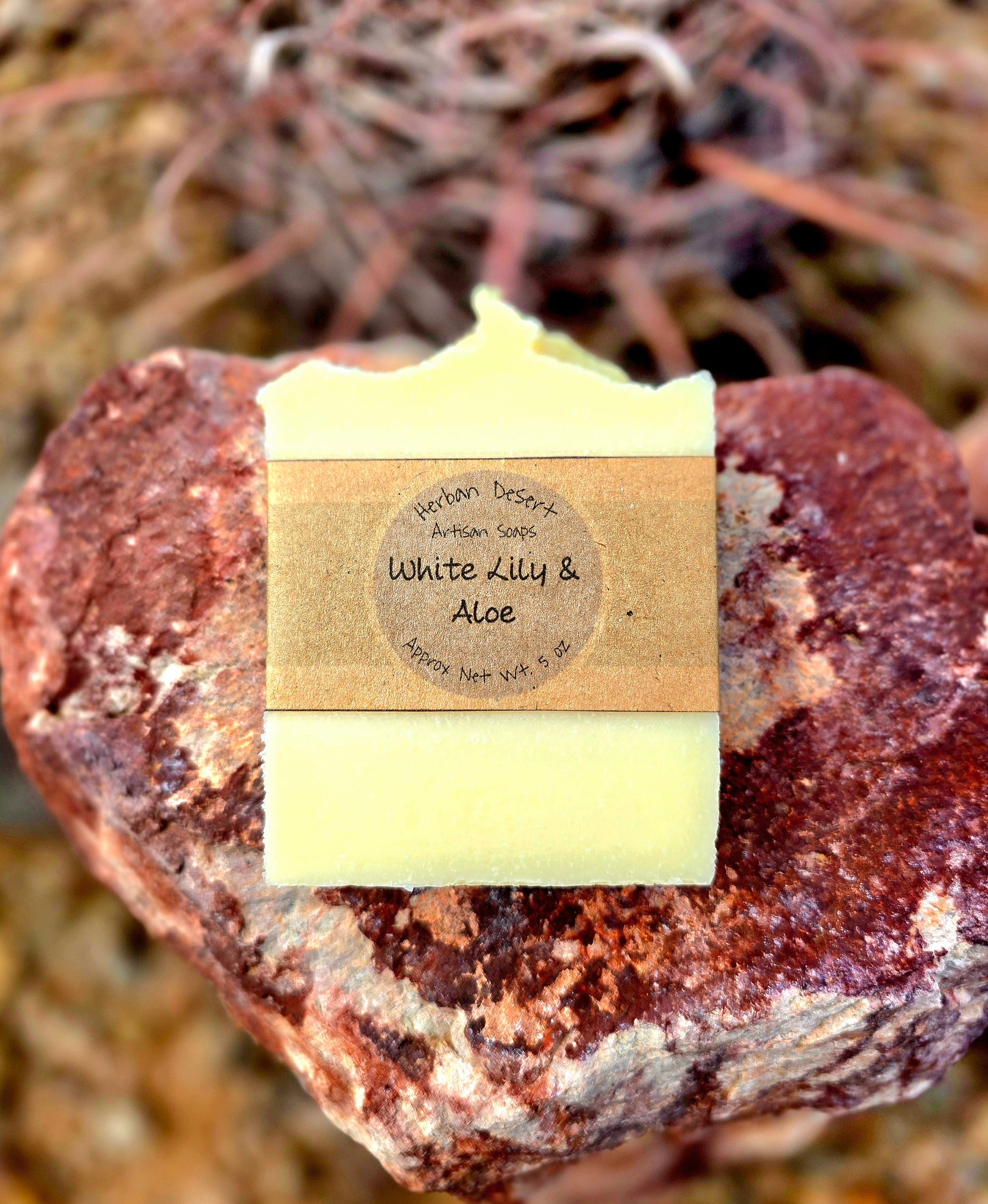 Handmade soap bar featuring white lily and aloe fragrance, crafted with grass-fed beef tallow, shea butter, and olive oil for deep hydration and gentle cleansing.
