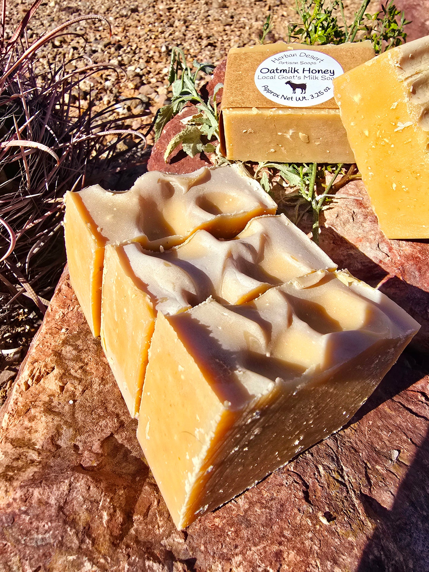 Handmade goat milk soap bar infused with oat milk and honey fragrance, crafted with grass-fed beef tallow, organic shea butter, and avocado oil for deep hydration and gentle cleansing.