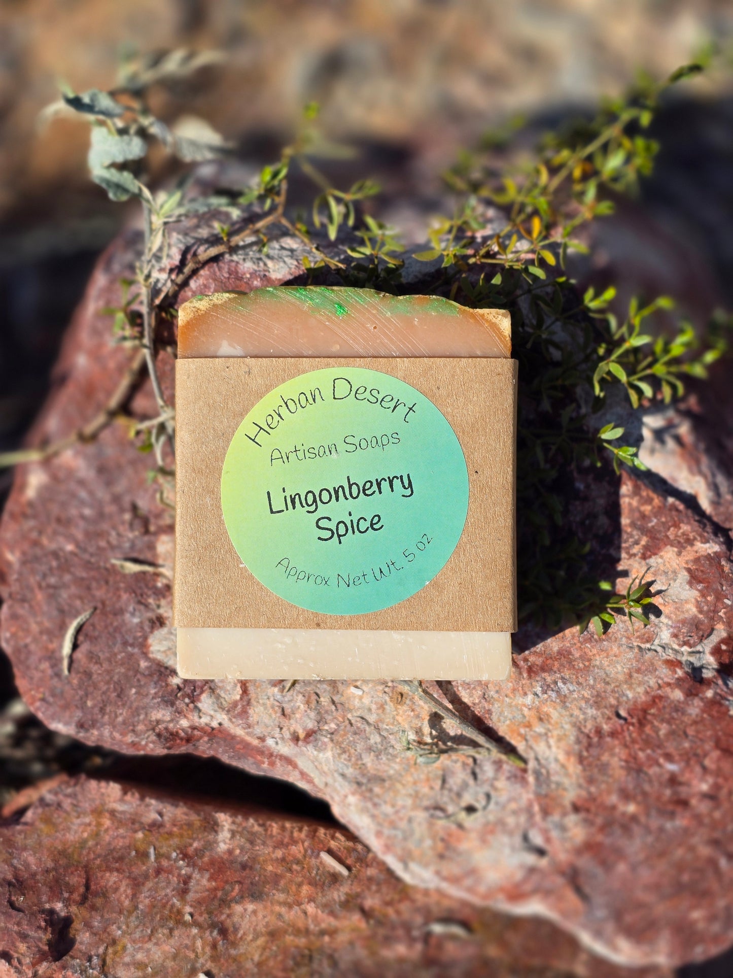 Handmade artisan soap bar featuring a blend of apple, frozen berry, lemon, balsam fir, cinnamon, clove, cedarwood, mountain air, and musk fragrances, crafted with moisturizing lard, olive oil, avocado oil, coconut oil, shea butter, and castor oil for a creamy lather.