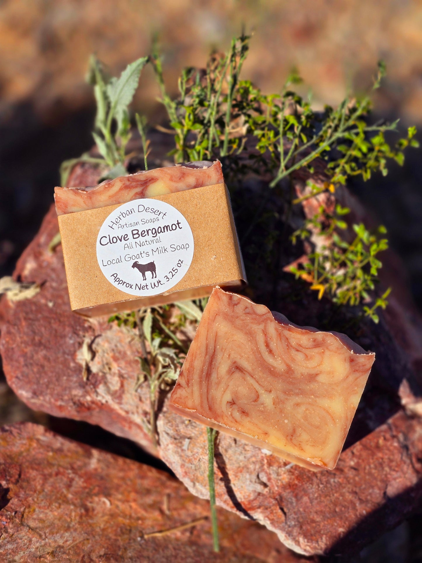 Handmade goat milk soap bar infused with clove and bergamot essential oils, crafted with grass-fed beef tallow, organic shea butter, and avocado oil for deep hydration and gentle cleansing.