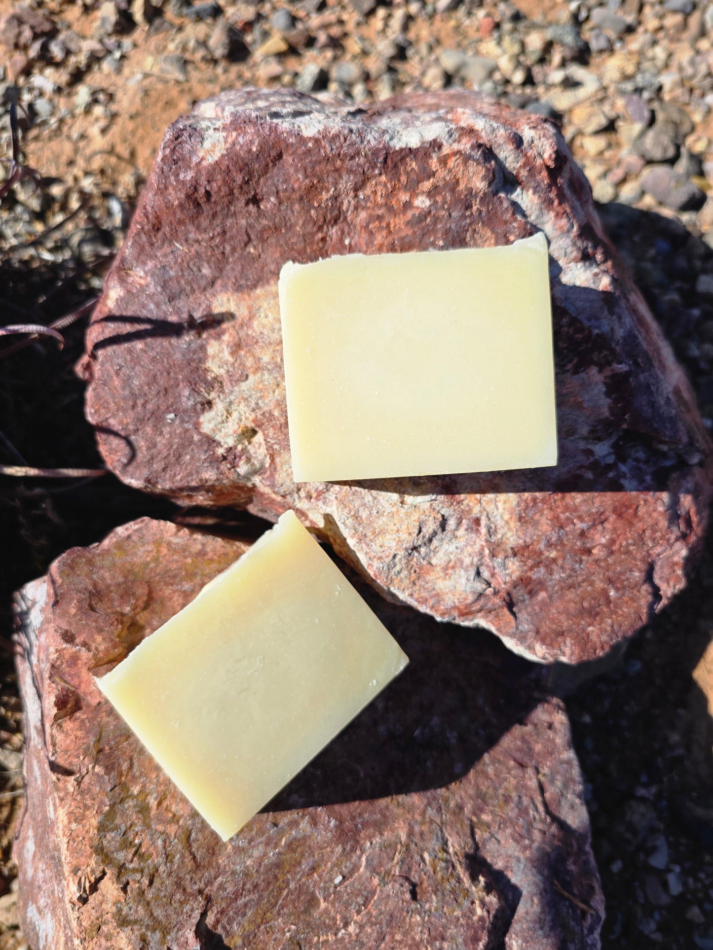 Handmade goat milk soap bar infused with chamomile fragrance, crafted with grass-fed beef tallow, organic shea butter, and avocado oil for deep hydration and gentle cleansing.