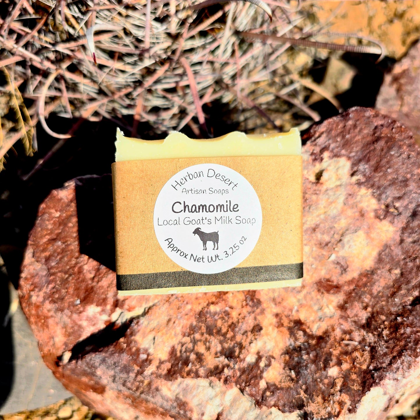 Handmade goat milk soap bar infused with chamomile, crafted with grass-fed beef tallow, organic shea butter, and avocado oil for deep hydration and gentle cleansing.