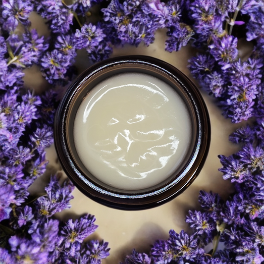 Close-up of Herban Desert's Lavender & Wildflower Honey Tallow Balm, highlighting its creamy texture and eco-friendly packaging