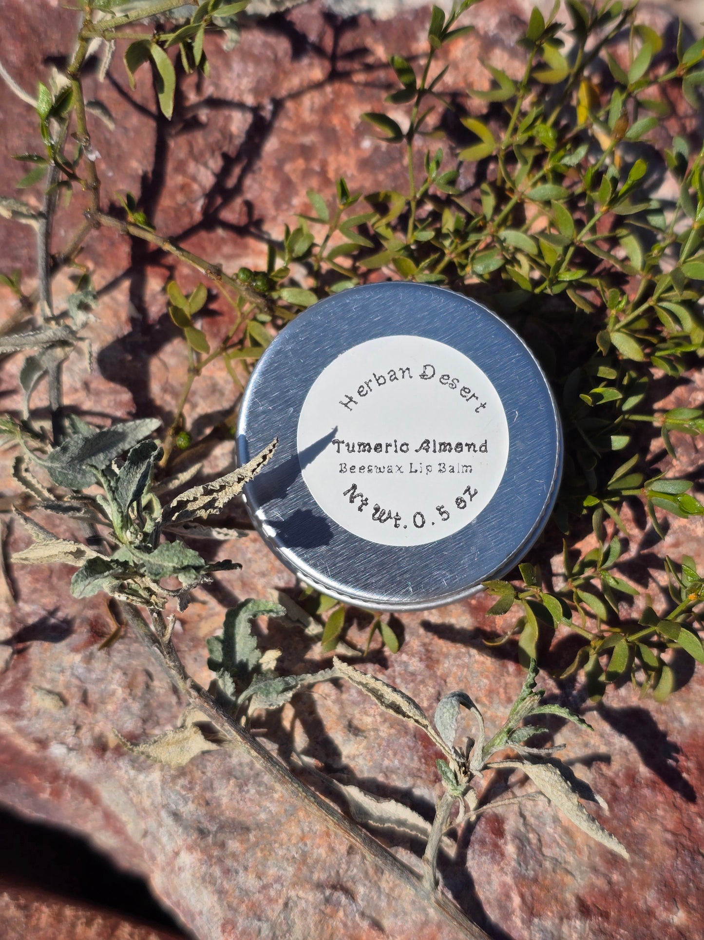 Our all-natural organic beeswax lip balm is a nourishing treat for your lips, infused with the soothing benefits of sweet almond oil and the antioxidant power of turmeric. This rich, moisturizing formula locks in hydration, leaving your lips soft, smooth, and protected all day long.